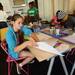 Ypsilanti Community Schools junior Nayan Khanna designs a puzzle piece artwork during the Student Engagement Summit at the Neutral Zone on Friday, August 23, 2013. Melanie Maxwell | AnnArbor.com